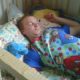 An old Man sleeping on the bed in home