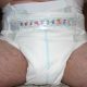 A man Wearing the Adult diaper and shows them In close up