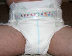 A man Wearing the Adult diaper and shows them In close up