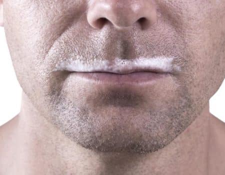 Hot Man showing the milk moustache