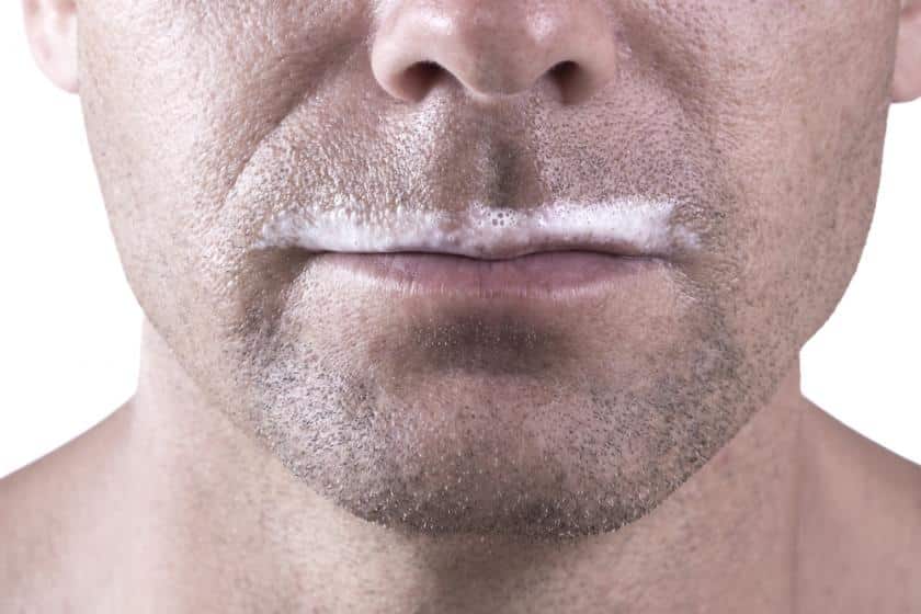 Hot Man showing the milk moustache