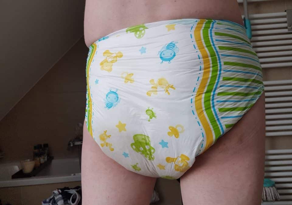 Hot sexy Man Shows Off his Wet adult baby Diaper