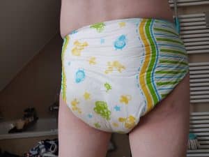 Hot sexy Man Shows Off his Wet adult baby Diaper