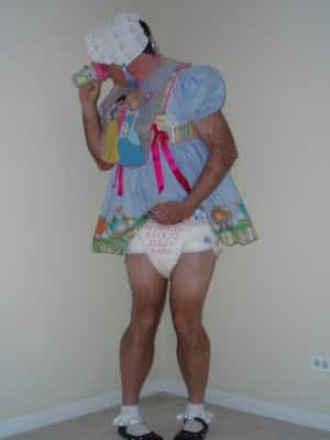 Boy wearing the baby adult diaper and sissy dress