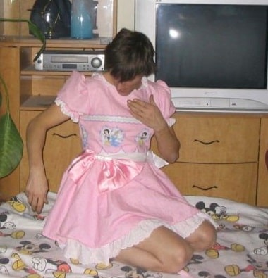 Mommy Sissy Girl kneeling on the bed