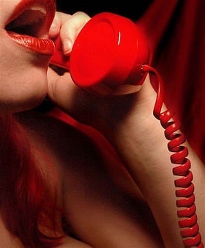 Hot Sensual Call Girl Talking on Red Phone