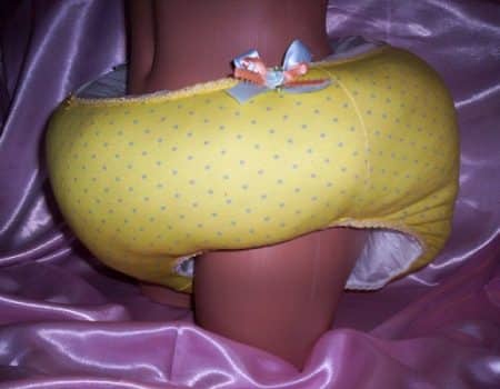 Naked teen wearing the waddle yellow diaper