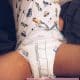 Boy wearing the baby adult wet diaper