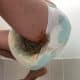 A boy Wearing The Very Dirty leaky diaper