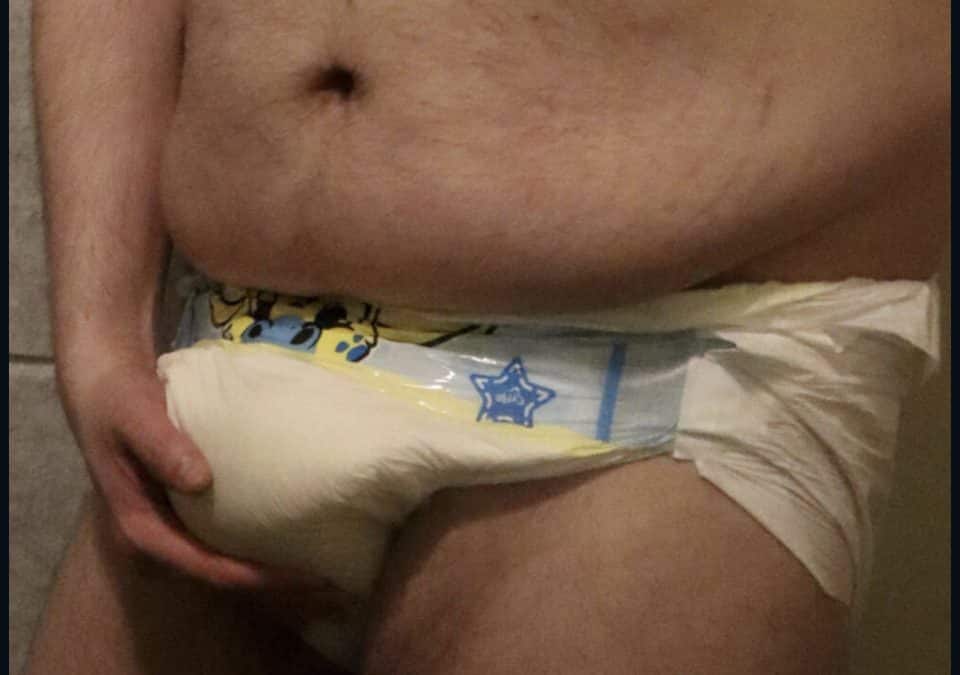 The Adult baby wears nappies day and night