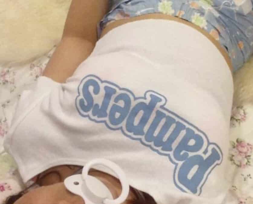 Adult Teen Girl Lying To taking The selfie of her diaper pic