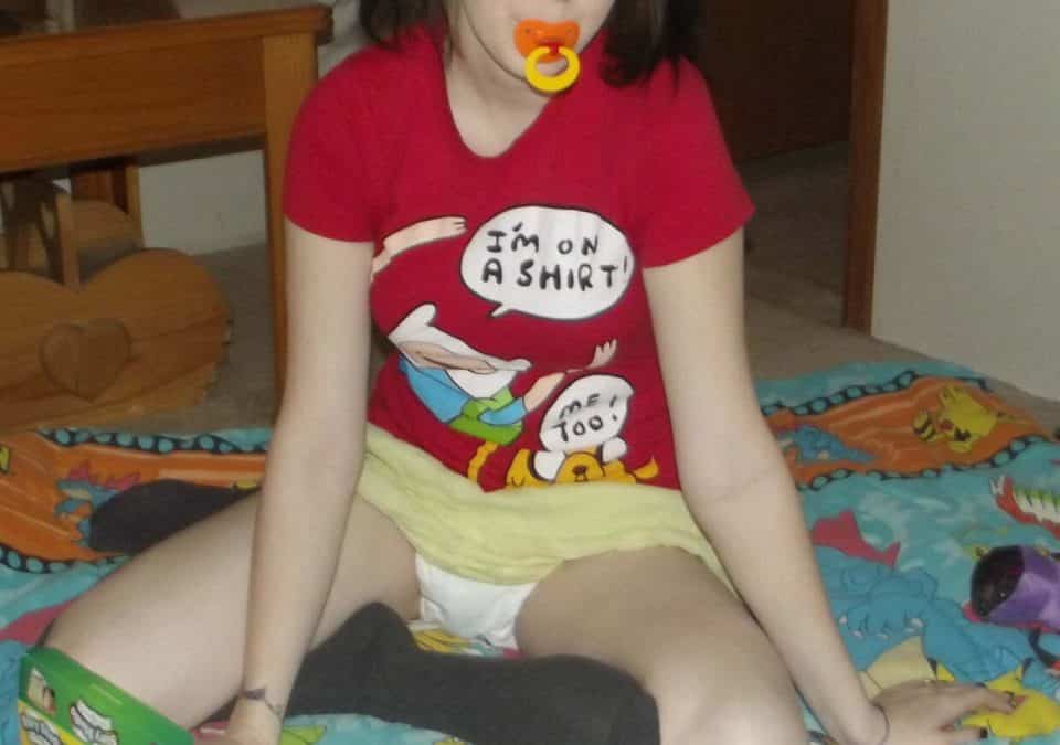 Girl Playing to sucking the baby nipple in her room