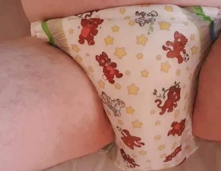 A Boy wearing the baby adult diaper
