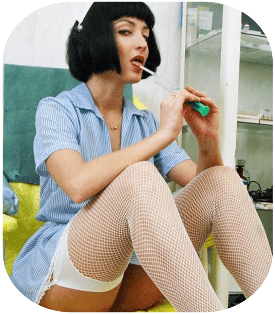 Hottest Nurse sitting with Licking the syringe