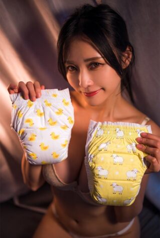 Mommy training her adult baby with diapers